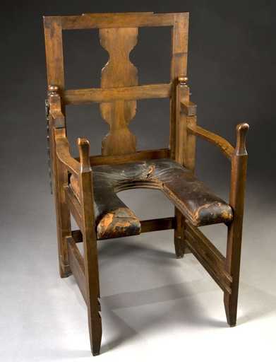 Wooden birthing chair.